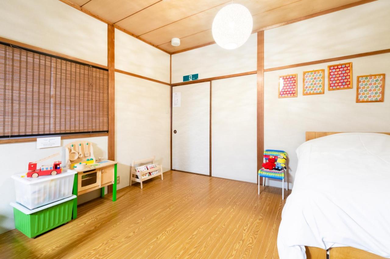 Ferienwohnung Chikyuutabikazoku Usj Ōsaka Exterior foto