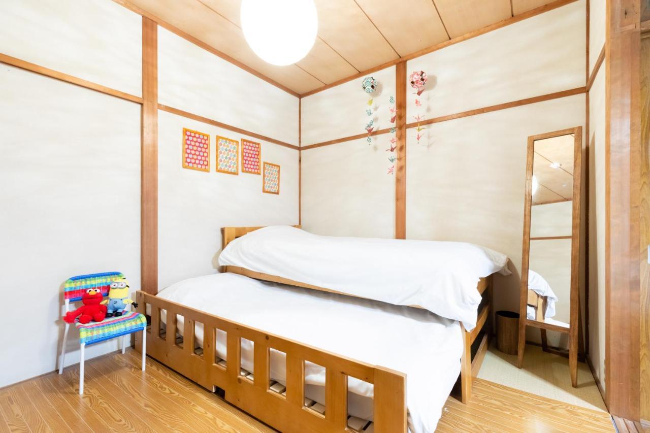 Ferienwohnung Chikyuutabikazoku Usj Ōsaka Exterior foto